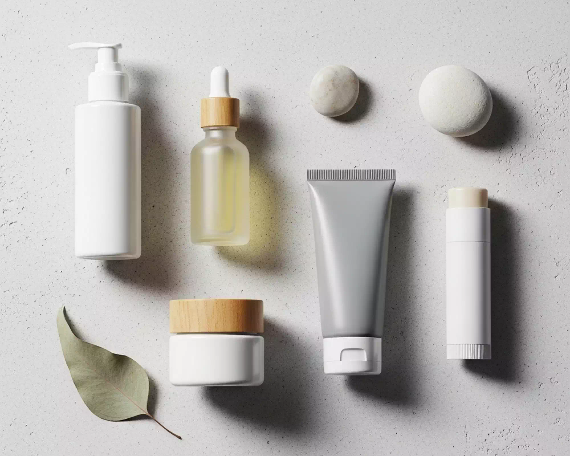 Artistic conceptual photo of five essential skincare products highlighted as the core foundation of a routine.